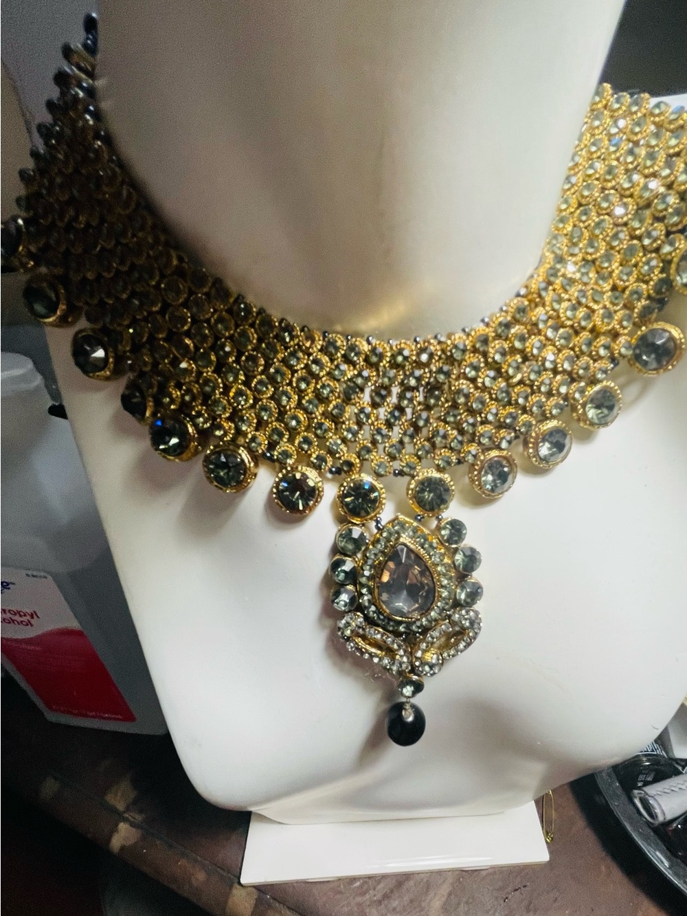 Gold-Tone Crystal Choker Necklace with simulated blue sapphire Accent Teardrop.